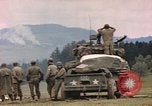 Image of U.S tank shells a German village at end of World War II Germany, 1945, second 48 stock footage video 65675076623