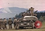 Image of U.S tank shells a German village at end of World War II Germany, 1945, second 50 stock footage video 65675076623
