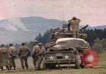 Image of U.S tank shells a German village at end of World War II Germany, 1945, second 51 stock footage video 65675076623