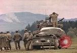 Image of U.S tank shells a German village at end of World War II Germany, 1945, second 52 stock footage video 65675076623