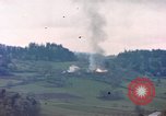 Image of U.S tank shells a German village at end of World War II Germany, 1945, second 56 stock footage video 65675076623