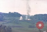 Image of U.S tank shells a German village at end of World War II Germany, 1945, second 62 stock footage video 65675076623