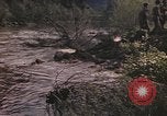 Image of U.S. troops ride on tanks crossing a stream Germany, 1945, second 21 stock footage video 65675076625