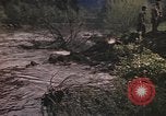 Image of U.S. troops ride on tanks crossing a stream Germany, 1945, second 22 stock footage video 65675076625