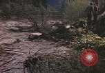 Image of U.S. troops ride on tanks crossing a stream Germany, 1945, second 23 stock footage video 65675076625
