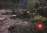 Image of U.S. troops ride on tanks crossing a stream Germany, 1945, second 24 stock footage video 65675076625