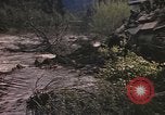Image of U.S. troops ride on tanks crossing a stream Germany, 1945, second 26 stock footage video 65675076625