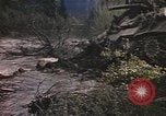 Image of U.S. troops ride on tanks crossing a stream Germany, 1945, second 28 stock footage video 65675076625