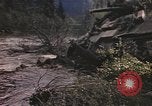 Image of U.S. troops ride on tanks crossing a stream Germany, 1945, second 29 stock footage video 65675076625