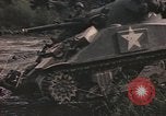 Image of U.S. troops ride on tanks crossing a stream Germany, 1945, second 35 stock footage video 65675076625