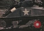 Image of U.S. troops ride on tanks crossing a stream Germany, 1945, second 37 stock footage video 65675076625