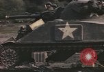 Image of U.S. troops ride on tanks crossing a stream Germany, 1945, second 38 stock footage video 65675076625