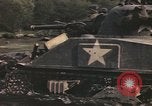 Image of U.S. troops ride on tanks crossing a stream Germany, 1945, second 40 stock footage video 65675076625