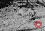 Standbild Bambus Container Birma, 1943, aus Sekunde 15 historischem Filmmaterial Videoclip 65675076652