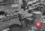 Standbild Mess Kit Reklamation Aktivitäten Zweiten Weltkrieg Europäische Theater, 1945, aus Sekunde 33 historischem Filmmaterial Videoclip 65675076670