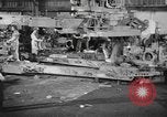 Image of Army artillery being repaired and reconditioned in a factory United States USA, 1945, second 3 stock footage video 65675076676