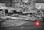 Image of Army artillery being repaired and reconditioned in a factory United States USA, 1945, second 4 stock footage video 65675076676