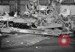 Image of Army artillery being repaired and reconditioned in a factory United States USA, 1945, second 5 stock footage video 65675076676