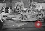 Image of Army artillery being repaired and reconditioned in a factory United States USA, 1945, second 6 stock footage video 65675076676