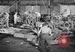 Image of Army artillery being repaired and reconditioned in a factory United States USA, 1945, second 8 stock footage video 65675076676