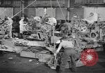 Image of Army artillery being repaired and reconditioned in a factory United States USA, 1945, second 9 stock footage video 65675076676