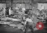 Image of Army artillery being repaired and reconditioned in a factory United States USA, 1945, second 10 stock footage video 65675076676