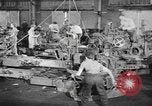 Image of Army artillery being repaired and reconditioned in a factory United States USA, 1945, second 11 stock footage video 65675076676
