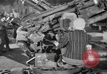 Image of Army artillery being repaired and reconditioned in a factory United States USA, 1945, second 12 stock footage video 65675076676