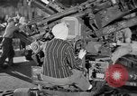 Image of Army artillery being repaired and reconditioned in a factory United States USA, 1945, second 14 stock footage video 65675076676