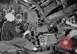 Image of Army artillery being repaired and reconditioned in a factory United States USA, 1945, second 16 stock footage video 65675076676