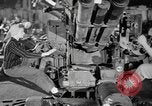 Image of Army artillery being repaired and reconditioned in a factory United States USA, 1945, second 18 stock footage video 65675076676