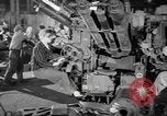 Image of Army artillery being repaired and reconditioned in a factory United States USA, 1945, second 19 stock footage video 65675076676