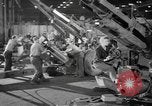 Image of Army artillery being repaired and reconditioned in a factory United States USA, 1945, second 21 stock footage video 65675076676