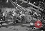 Image of Army artillery being repaired and reconditioned in a factory United States USA, 1945, second 22 stock footage video 65675076676