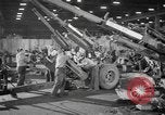 Image of Army artillery being repaired and reconditioned in a factory United States USA, 1945, second 23 stock footage video 65675076676