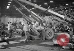 Image of Army artillery being repaired and reconditioned in a factory United States USA, 1945, second 24 stock footage video 65675076676