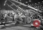 Image of Army artillery being repaired and reconditioned in a factory United States USA, 1945, second 25 stock footage video 65675076676