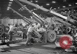 Image of Army artillery being repaired and reconditioned in a factory United States USA, 1945, second 26 stock footage video 65675076676