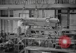 Image of Army artillery being repaired and reconditioned in a factory United States USA, 1945, second 28 stock footage video 65675076676
