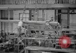 Image of Army artillery being repaired and reconditioned in a factory United States USA, 1945, second 31 stock footage video 65675076676