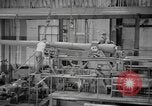 Image of Army artillery being repaired and reconditioned in a factory United States USA, 1945, second 32 stock footage video 65675076676
