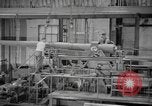 Image of Army artillery being repaired and reconditioned in a factory United States USA, 1945, second 33 stock footage video 65675076676