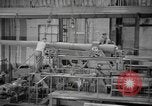 Image of Army artillery being repaired and reconditioned in a factory United States USA, 1945, second 34 stock footage video 65675076676