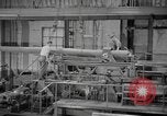 Image of Army artillery being repaired and reconditioned in a factory United States USA, 1945, second 37 stock footage video 65675076676