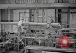 Image of Army artillery being repaired and reconditioned in a factory United States USA, 1945, second 38 stock footage video 65675076676