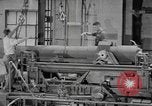 Image of Army artillery being repaired and reconditioned in a factory United States USA, 1945, second 41 stock footage video 65675076676