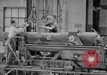 Image of Army artillery being repaired and reconditioned in a factory United States USA, 1945, second 44 stock footage video 65675076676