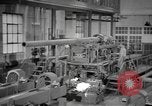 Image of Army artillery being repaired and reconditioned in a factory United States USA, 1945, second 49 stock footage video 65675076676