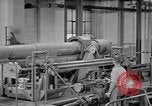Image of Army artillery being repaired and reconditioned in a factory United States USA, 1945, second 53 stock footage video 65675076676