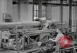 Image of Army artillery being repaired and reconditioned in a factory United States USA, 1945, second 55 stock footage video 65675076676